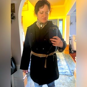 Burberry jacket. Lining inside in great condition as well. Great jacket!